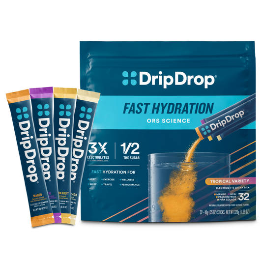 dripdrop-tropical-variety-pack-electrolyte-powder-8-oz-sticks-32-count-z0 Tropical_Variety_-_32ct_-_Transparent.png